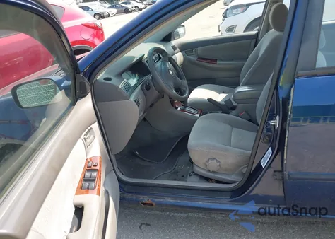 2003 Toyota Corolla Le z USA, uszkodzony, nr VIN 2T1BR38E23C144532